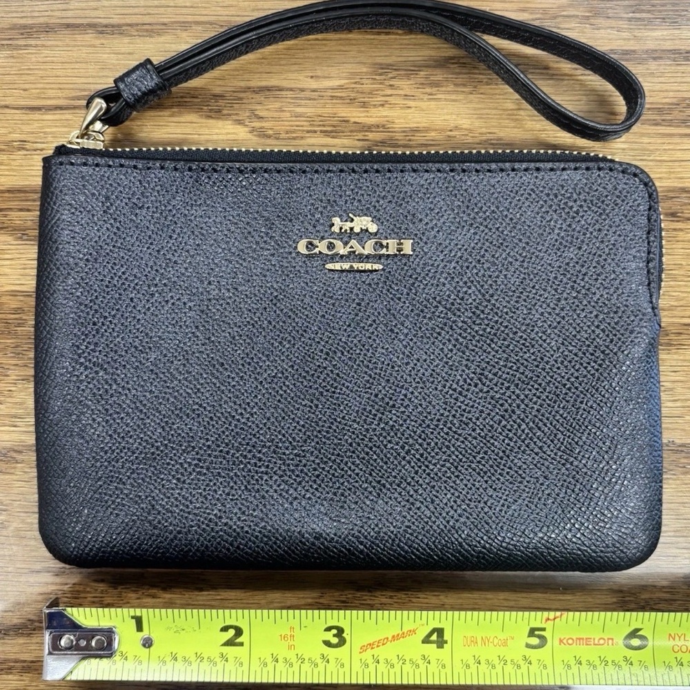 Coach Midnight Blue Wristlet Clutch with Gold Metal Logo. Not Embossed
